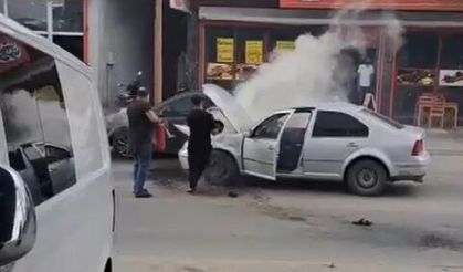 Otomobilde Çıkan Yangını Esnaf Söndürdü
