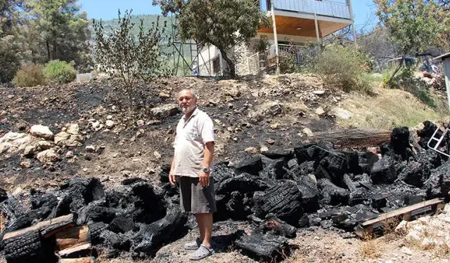 Kumluca yangınında emekli itfaiyeci evini alevlerden kurtardı