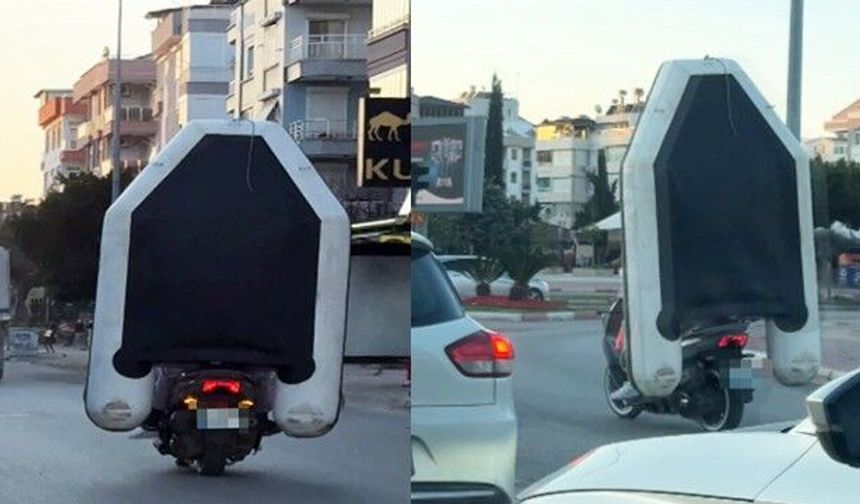 Antalya-Motosiklet üzerinde şişme botla tehlikeli yolculuk