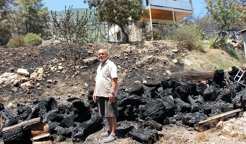 Kumluca yangınında emekli itfaiyeci evini alevlerden kurtardı